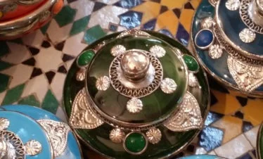 colourful pottery on zelig table - fes