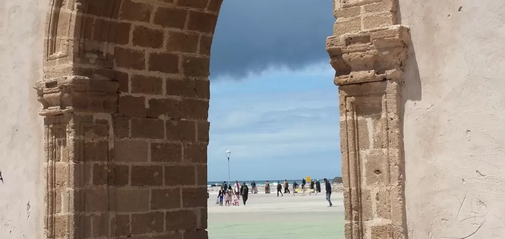 view of clouds & sky through gate in Essaouria medina