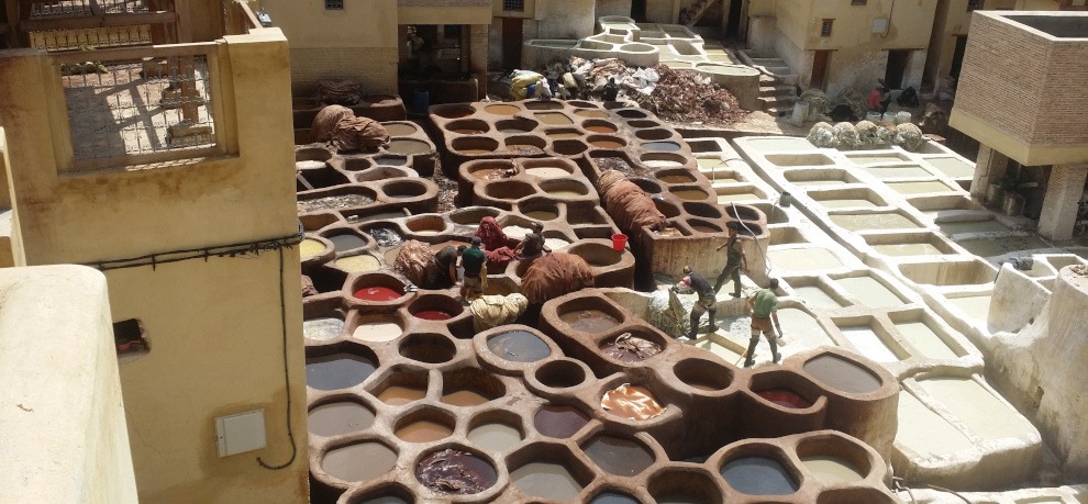 Dye pits at tanneries in Fes, Morocco - gallery image for 7 day Morocco itinerary from Fes - "Walled Cities & Wide-Open Spaces