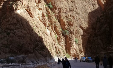 Steep walls of Todra Gorge - deep shadows contrasting with bright sunlight on rock cliffs
