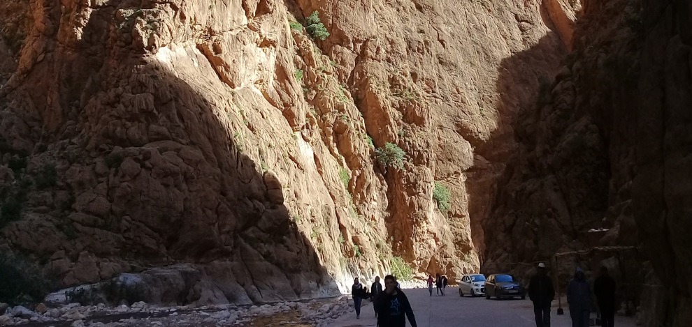 Steep walls of Todra Gorge - deep shadows contrasting with bright sunlight on rock cliffs