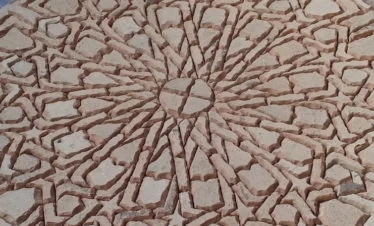 close-up of zelig mosaic tile medallion in process of being assembled in Fes - gallery image for 7 day Morocco itinerary from Fes - "Walled Cities & Wide-Open Spaces"