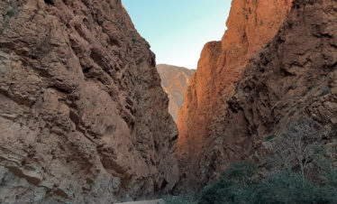 view between high cliff walls in narrow gorge at Dades Gorge