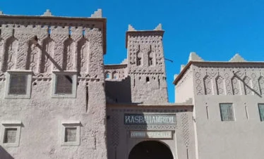 Skoura-Kasbah Amridil front facade against bright blue sky