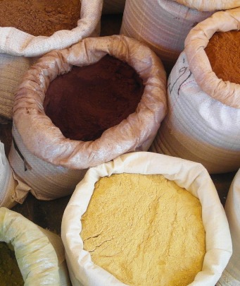 open bags of spices in Morocco souk