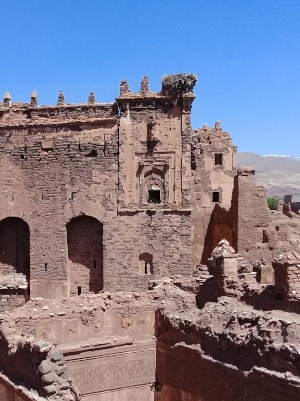 Telouet Kasbah-view of ruins of buildings with Atlas Mountains in the distance